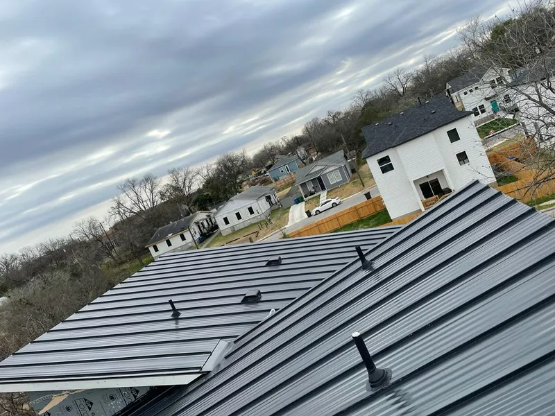 Standing seam metal roof panels with vents for Skylight Repair in River Forest